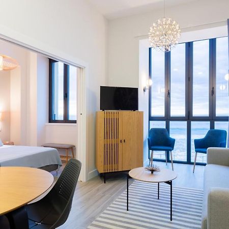 Apartamentos La Xiuca Playa Gijón Esterno foto