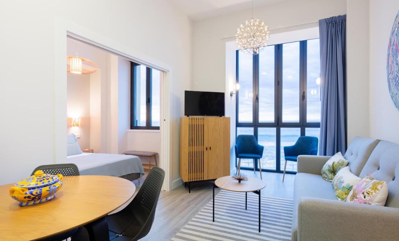 Apartamentos La Xiuca Playa Gijón Esterno foto